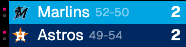 ABS challenge dots beside Marlins and Astros scores